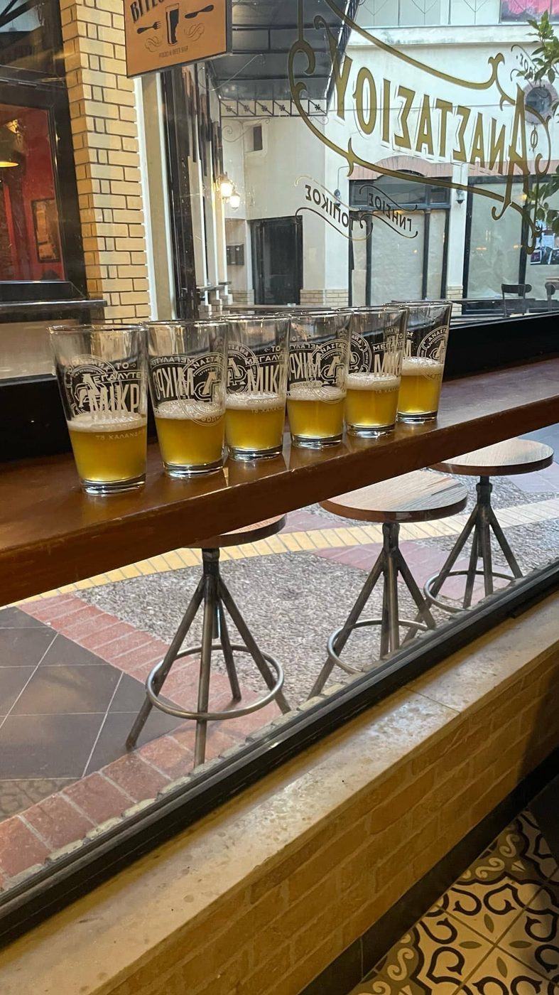 Five glasses of beer lined up for tasting