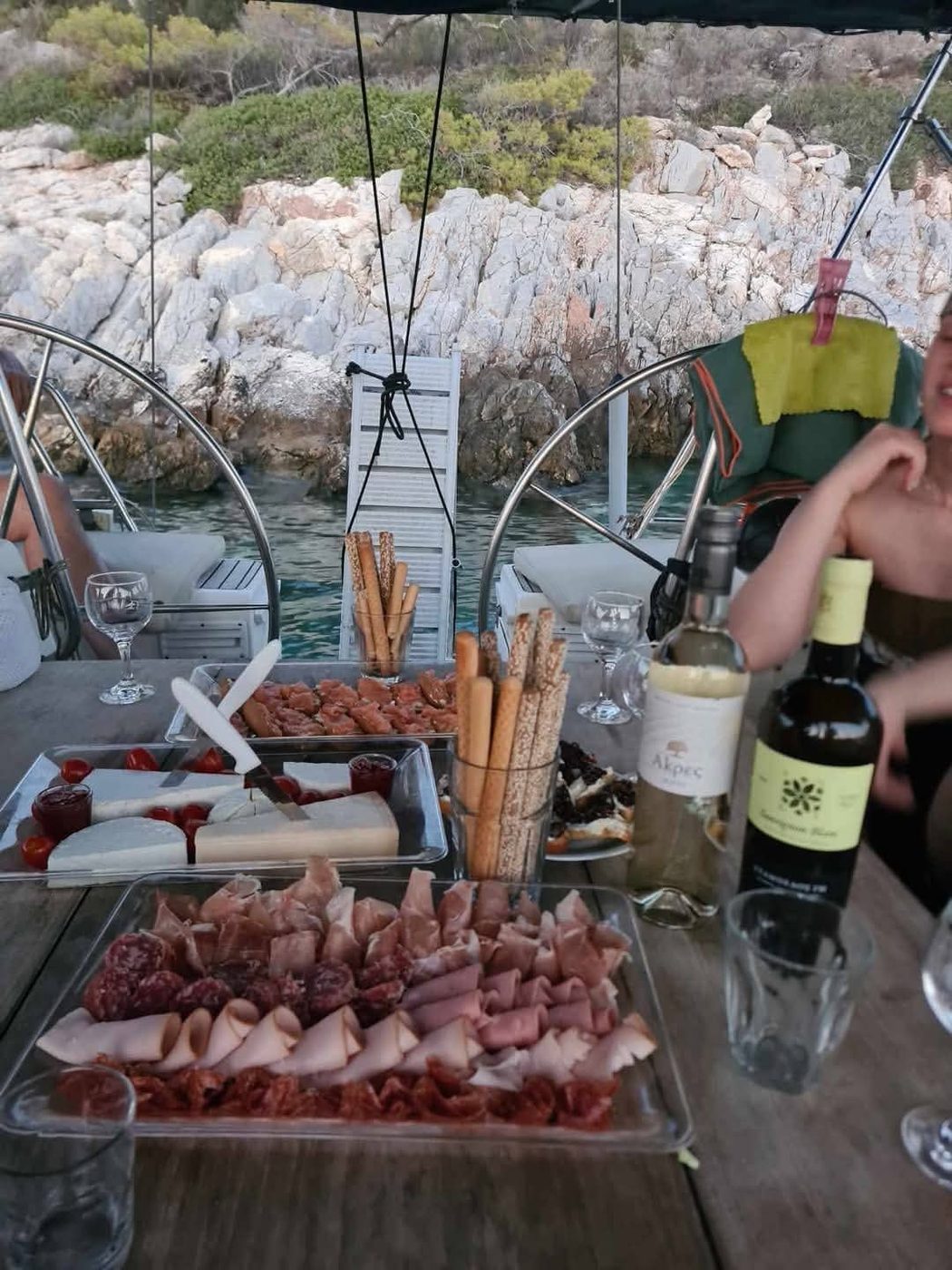 Small plates and wine on deck